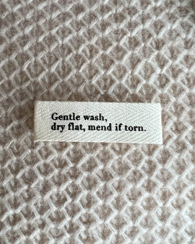 - Dog anti-slip mat"Gentle wash, dry flat, mend if torn."-label